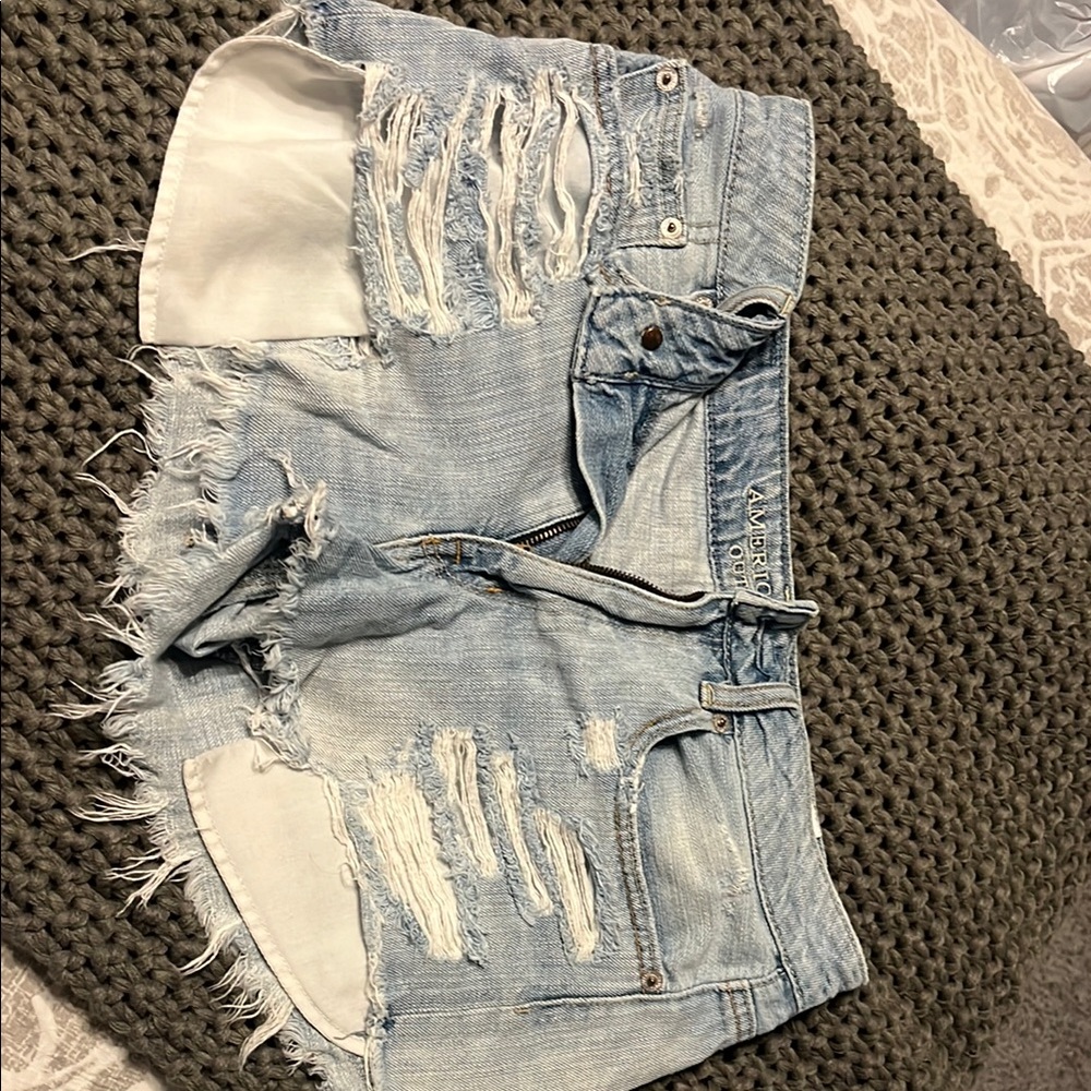 Distressed Light Blue Denim Shorts